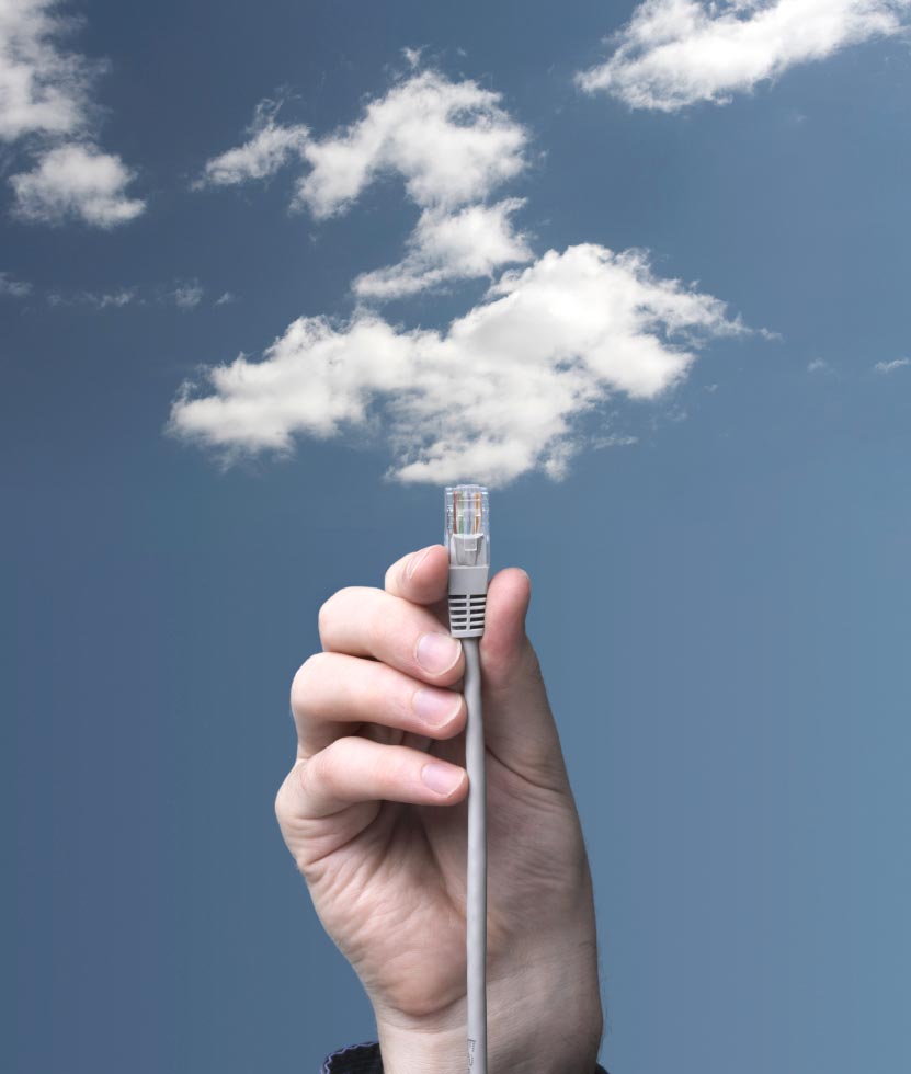 Hand Holding LAN Cable in Air